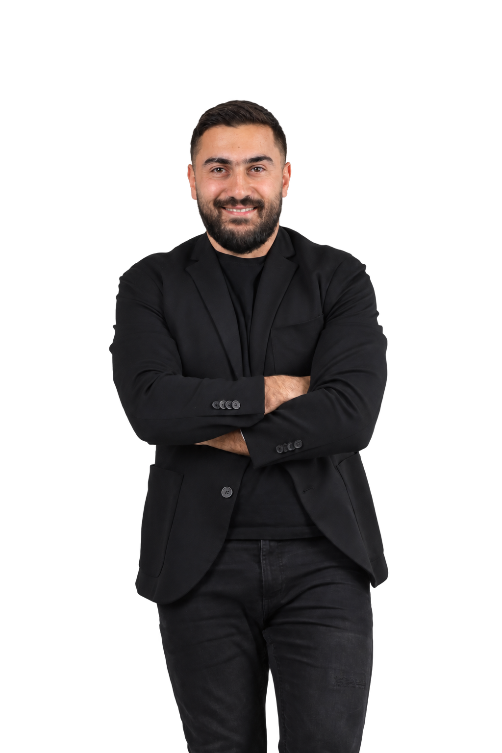 Original portrait of Roman Sahakov wearing a black blazer, with his arms crossed.